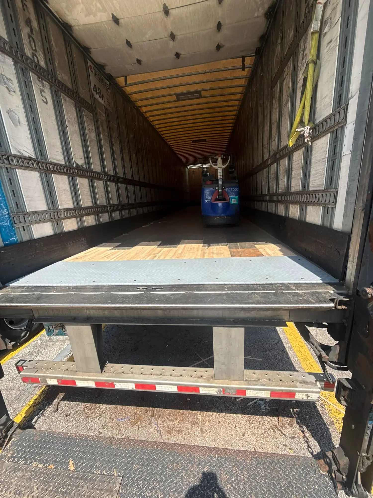 Hardwood trailer floors split, rot and eventually blow through where the pallet jack rolls.